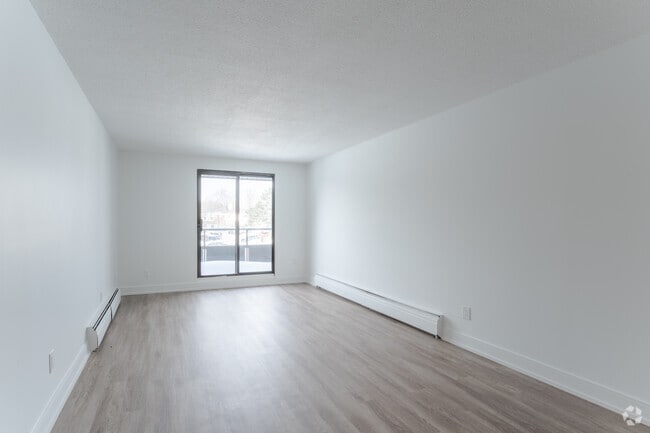 2BR, 1BA - 924SF - Living Room - 130,140,150 Christopher Drive