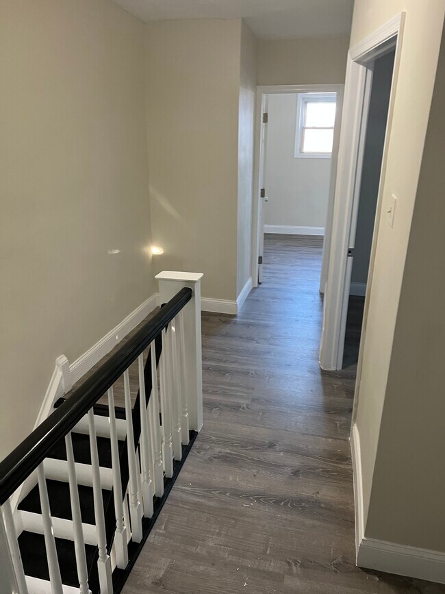 Spacious in house walkway on 2nd floor. - 1528 E Mayland St