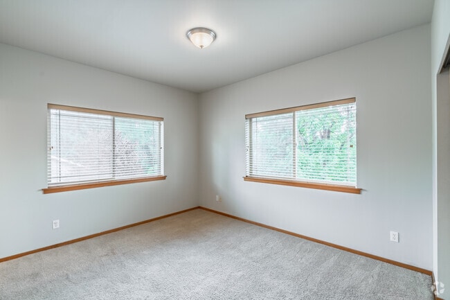 2BR, 2BA - 900SF - Primary Bedroom - Sunset Terrace