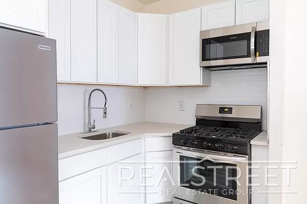 Foto del edificio - Bright & Modern 3BD/2BA Top-Floor Unit wit...