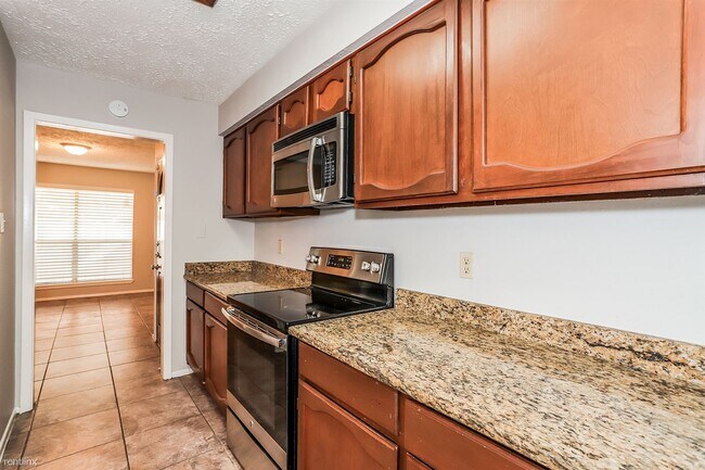 Building Photo - 3 br, 2 bath House - 14214 Bateau Dr