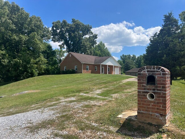 Building Photo - Stunning One Level Home located in central...