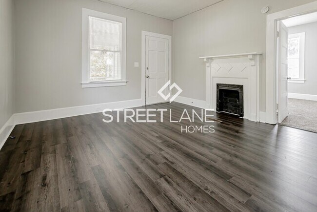 Building Photo - NOW OFFERING HALF OFF THE FIRST FULL MONTH...