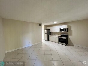 Building Photo - 612 NE 29th Dr