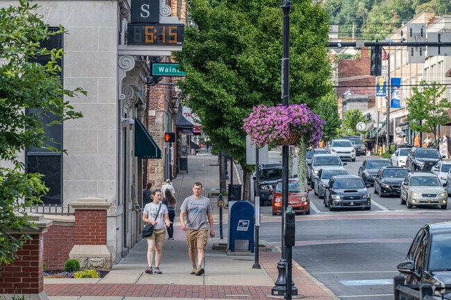 Residents enjoy walking downtown.