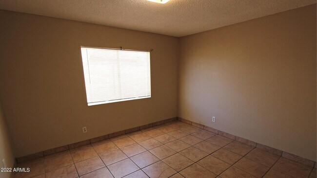 Building Photo - 6440 E Alder Ave