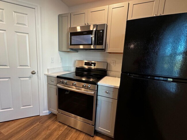Building Photo - Step into the future of living with our sl...