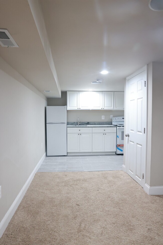 Open Living Space and Kitchen - 4930 Minnesota Ave NE