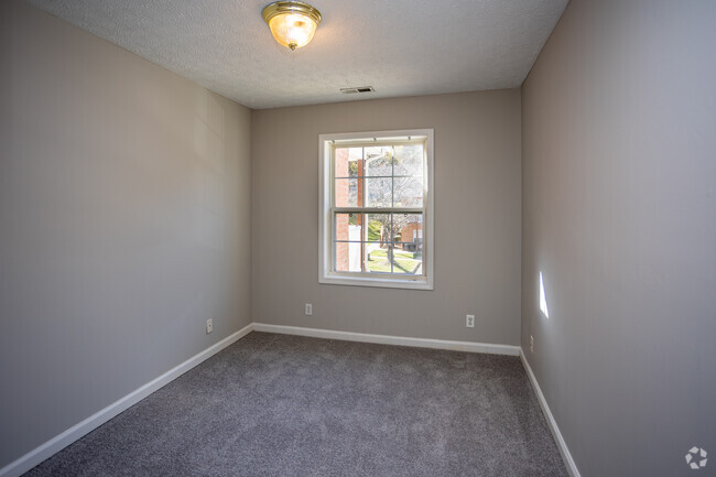 3BR, 2BA - 957SF - Second Bedroom - Doe Ridge Apartments