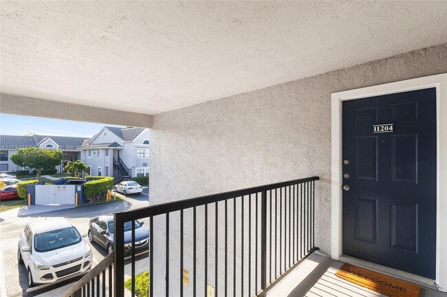 Building Photo - 10381 SW 150th Ct