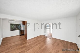 Building Photo - 2458 Normandie Ave