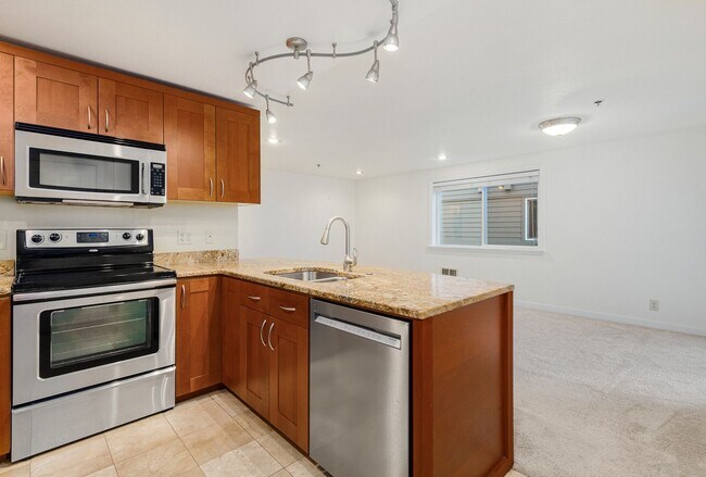 Building Photo - Updated Cap Hill Bedroom with 1 reserved p...