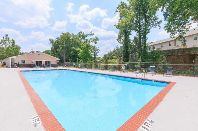 Enjoy the summer in our community pool! - The Orchard Apartments