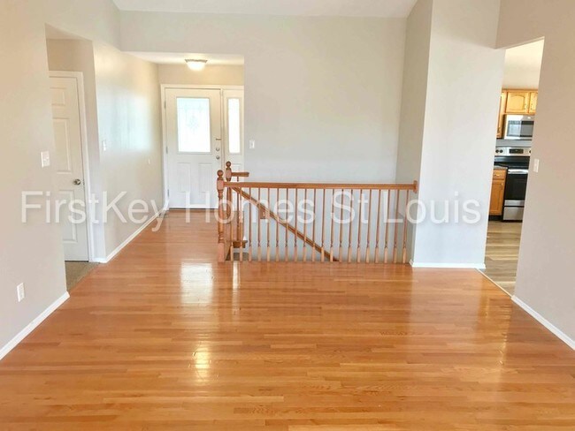 Foto del edificio - 14 Rivermeadows Dr