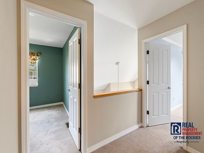 Building Photo - Fort Collins Townhouse with Vaulted Ceilin...