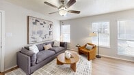 Located in Fort Worth, TX, this thoughtfully designed one-bedroom, one-bathroom residence offers a smart, single-level layout that maximizes every square foot. The open-concept living, dining, and kitchen area serves as the heart of the home, where wood-look flooring, neutral tones, and multiple windows with blinds create a bright and welcoming atmosphere. A ceiling fan anchors the living space, which is large enough to comfortably accommodate a full sofa arrangement. The galley-style kitchen is well-appointed with white shaker cabinetry, black appliances including a refrigerator, range, and over-the-range microwave, plus a pantry for additional storage. A dedicated dining area and breakfast bar provide flexible eating options. The bedroom features plush carpeting, a ceiling fan, a window for natural light, and two closets offering ample storage. The bathroom is clean and functional, featuring a white vanity with storage, a framed mirror, and a shower-tub combination. Additional conveniences include a laundry area. Throughout the residence, textured ceilings, consistent neutral paint, and cohesive finishes contribute to a comfortable and move-in-ready living environment.