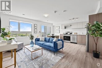 Building Photo - 100-100 Manett Crescent