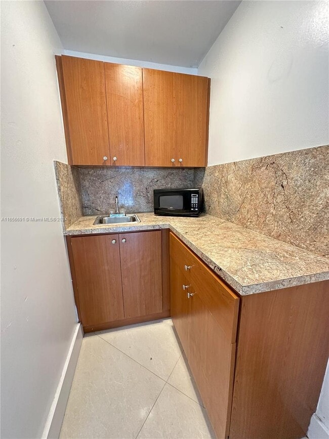 Building Photo - 7850 SW 132nd Ave