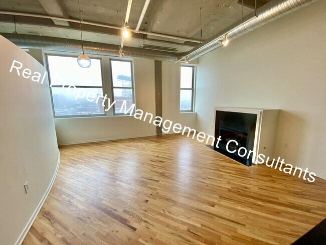 Building Photo - 2-Bedroom  in Western Auto Lofts