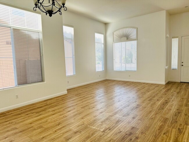 Bright formal living and dining area near the front entry. - 1177 W Laredo Ave (Gilbert, AZ) House