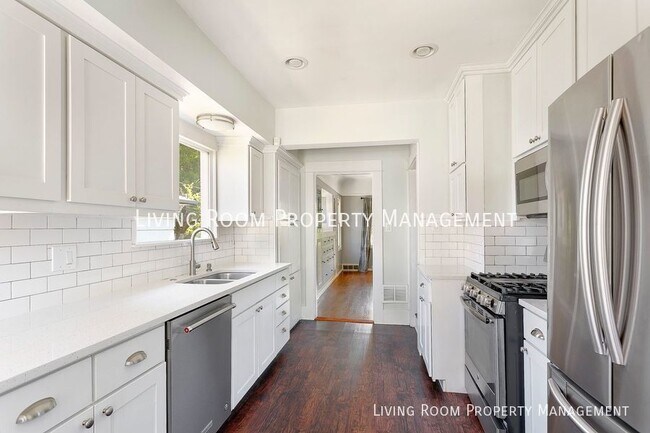 Building Photo - Craftsman Stunner w/ Finished Garage Bonus...