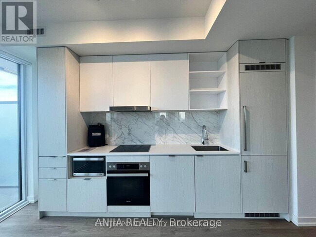 Photo du bâtiment - 55 Cooper St