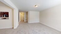 Located at 2214 Pederson Dr in Old Bridge, NJ, this single-floor, 2-bedroom, 2-bathroom home offers a thoughtfully designed layout across a comfortable and functional footprint. The open-concept living room is bright and inviting, featuring plush wall-to-wall carpeting, neutral tones, and large windows that frame views of the surrounding greenery, allowing natural light to fill the space throughout the day. A dedicated entryway provides a welcoming transition into the main living area.

The kitchen is a standout feature, boasting rich dark-wood cabinetry, granite countertops, tile flooring, and a full suite of stainless steel appliances including a gas range, built-in microwave, and refrigerator — providing both style and practicality for everyday cooking.

The spacious primary bedroom offers generous square footage with soft carpeting and ample closet space, while the second bedroom also benefits from natural light through large windows and a similar neutral, move-in-ready aesthetic. Both bathrooms are cleanly finished, with one featuring a full tub-shower combination accented by classic white subway tile.

A dedicated in-unit laundry room with side-by-side washer and dryer adds everyday convenience. Two additional closets throughout the home provide practical storage solutions, completing this well-rounded residence.