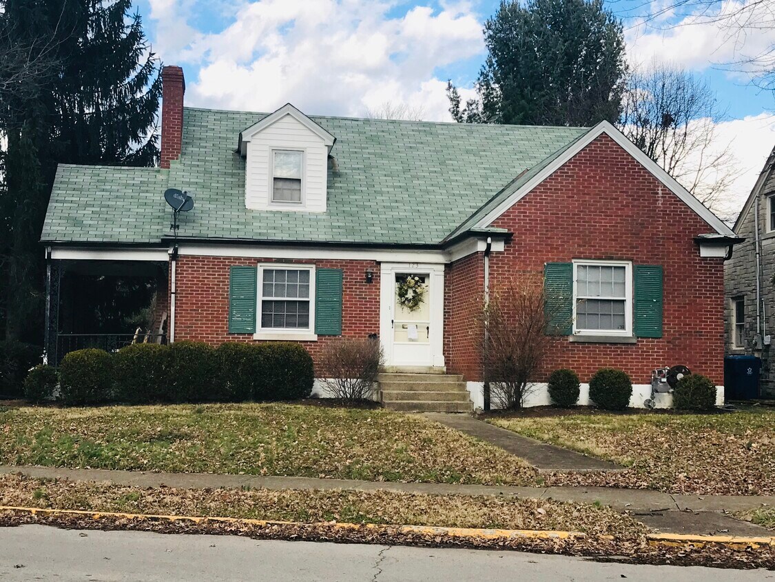 Nice 4 bedroom, 2 bath home across from the football stadium located on a corner lot at 123 Dantzler Dr. Home includes washer and dryer and full basement for great storage, Hardwood flooring, large den, and side porch. - 123 Dantzler Drive