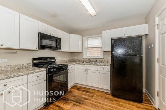 Building Photo - NOW AVAILABLE! - 8744 S Mozart Ave, Evergr...