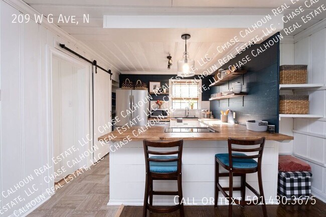 Building Photo - 209 W G Ave