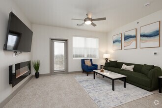 2BR, 2BA - 1,075SF - Living Room - Pueblo Springs