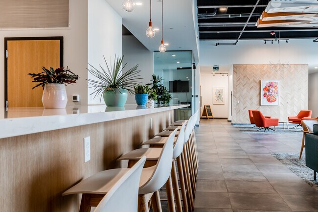 Sala de interior con bar - Corner Apartments