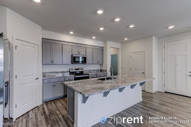 Building Photo - 3 br, 2.5 bath Townhome - 3080 Blue Cove W...