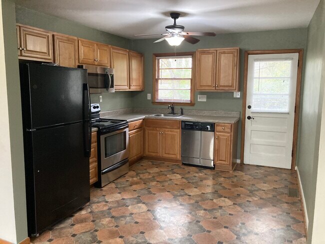 Kitchen with back door to deck - 1205 Brookwood Ave