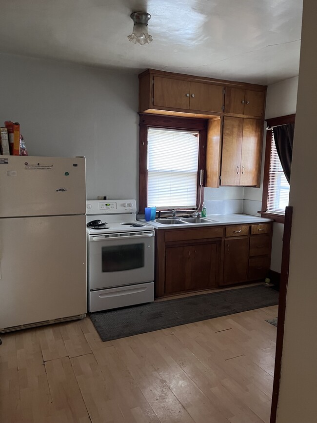 Kitchen-old flooring - 128 Linden Dr