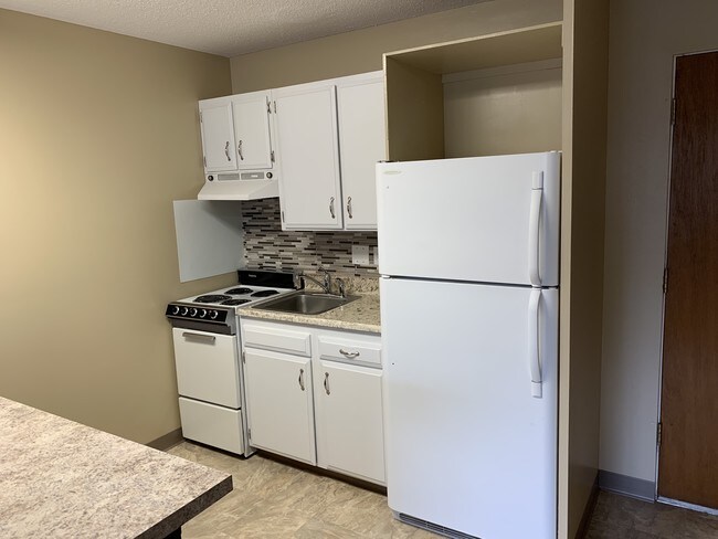 new refrigerator/cabinets - 110 10th St S