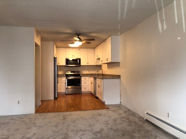 Building Photo - 6980 E Girard Ave