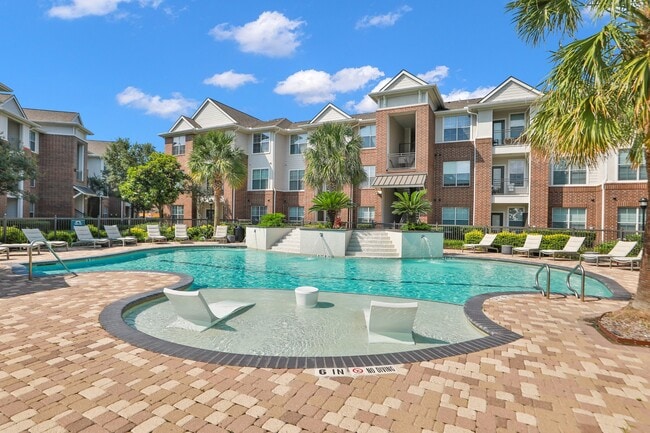 Outdoor Resort Style Pool at Madison on the Meadow Apartments in Stafford, TX 77477 - Madison on the Meadow