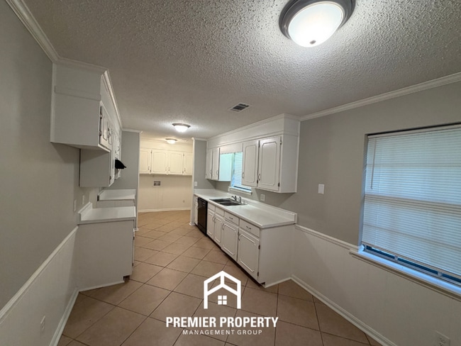Building Photo - Charming 3BR/2BA Northport Home with Hardwood Floors & Brick Fireplace!