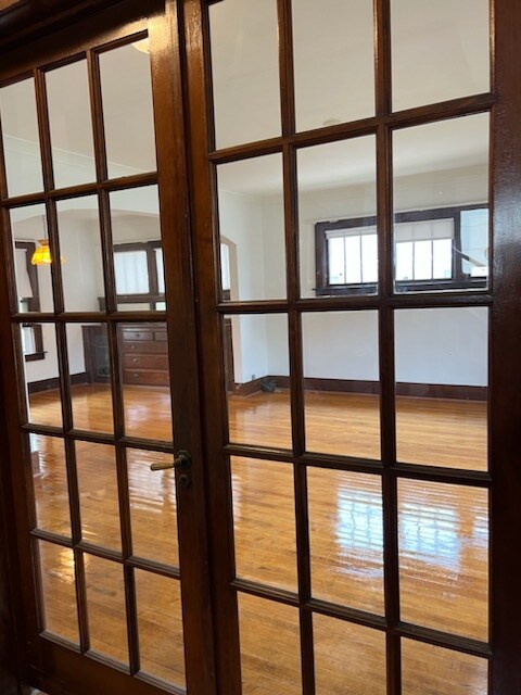 Charming french doors into living/dining area. - 2514 N 10th St