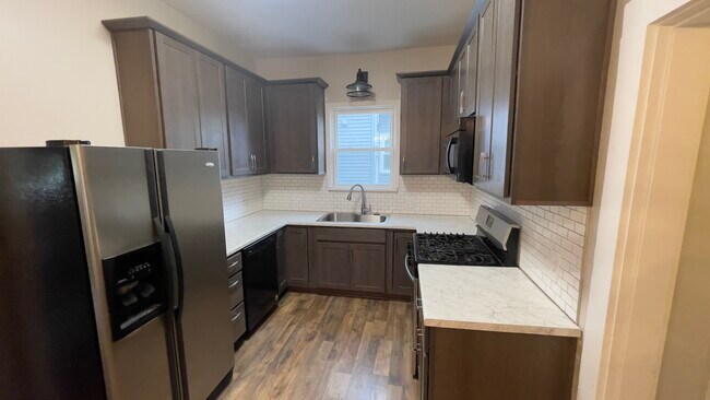 Appliances including fridge, dishwasher, stove, microwave, and disposal - 832 Lake Ave