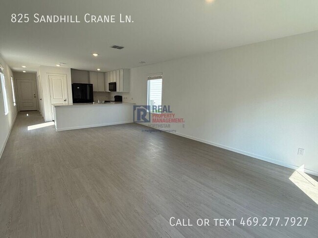 Foto del edificio - 825 Sandhill Crane Ln