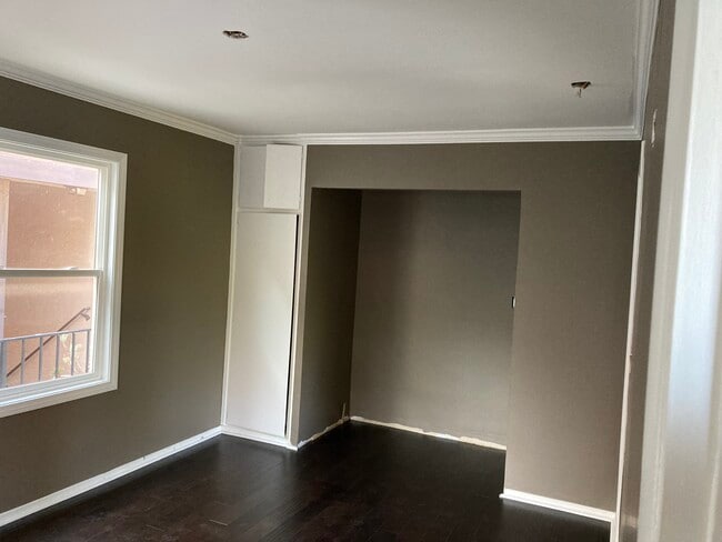 Murphy Bed Closet will have barn doors. - 1526 E Wilson Ave