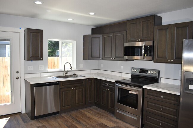 Building Photo - A St Townhomes
