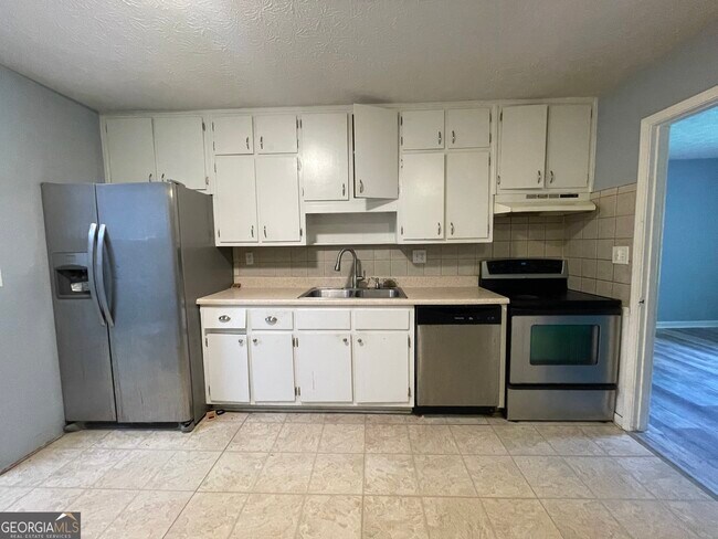 Foto del edificio - 5568 Rock Garden Ct NW