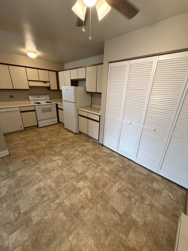 Kitchen with Pantry - Hemlock Street Apartments