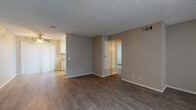 Located at 43531 Kirkland Ave in Lancaster, California, this single-story residence offers a well-organized layout designed for comfortable everyday living. Throughout the home, wood-style laminate flooring provides a clean, cohesive look, while textured ceilings and neutral-toned walls create a calm, understated atmosphere.

The open living area is generously sized, allowing for flexible furniture arrangements, and benefits from natural light filtering through vertical blinds. A ceiling fan adds to the comfort of the space. The adjoining kitchen is efficiently laid out in a galley style, featuring white cabinetry with ample storage, gray laminate countertops, a double sink, and white appliances including a gas range and refrigerator. A window with vertical blinds brings in additional natural light.

The bedrooms are well-proportioned, each finished with the same wood-style flooring and neutral walls. One bedroom includes a walk-in closet with built-in shelving, while another features a large sliding-door closet and a window with vertical blinds for privacy. The bathroom is clean and functional, equipped with a shower-tub combination, modern chrome fixtures, and coordinating wood-style flooring. HVAC vents throughout ensure year-round climate control in this move-in-ready Lancaster home.