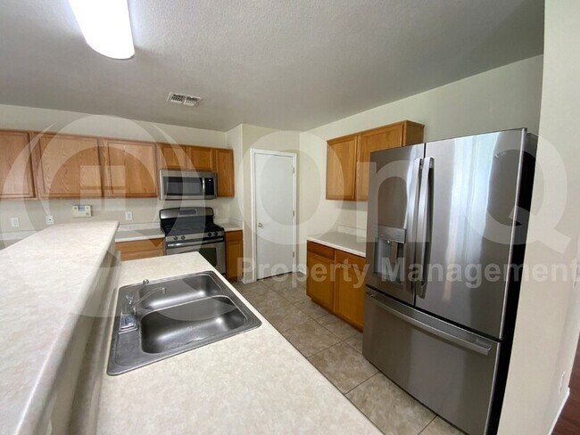 Building Photo - 7362 S MESSALA Ct