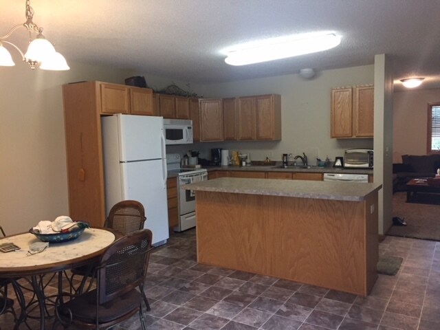 kitchen and dining - 208 Coves Ct