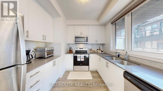 Photo du bâtiment - 9460-9460 The Gore Rd